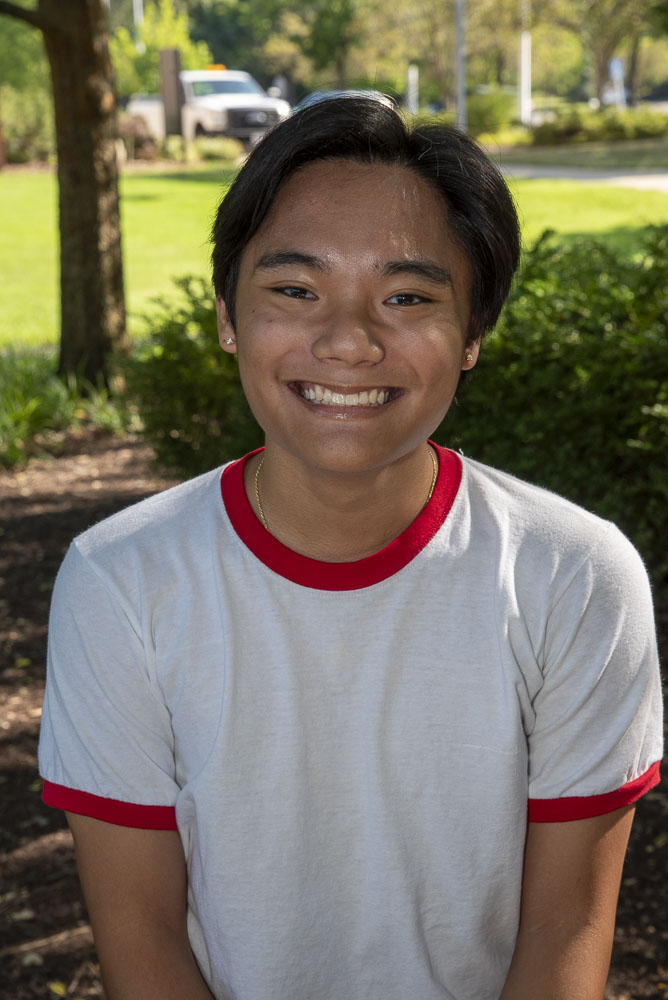 student standing outside on the UC Blue Ash campus