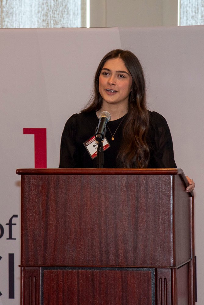 Autrey Watkins giving a speech at podium