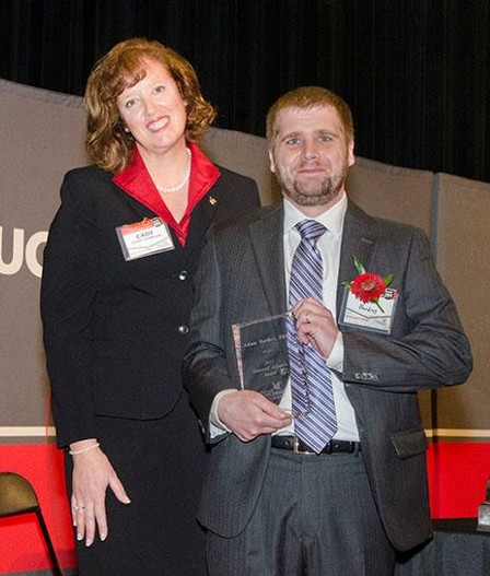 Dean Cady Short-Thompson with Dr. Adam Burkey with award