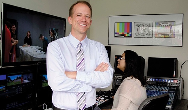 Professor Eric Anderson standing in class