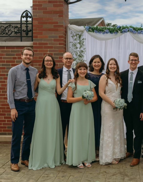Bob Klein with family at a wedding