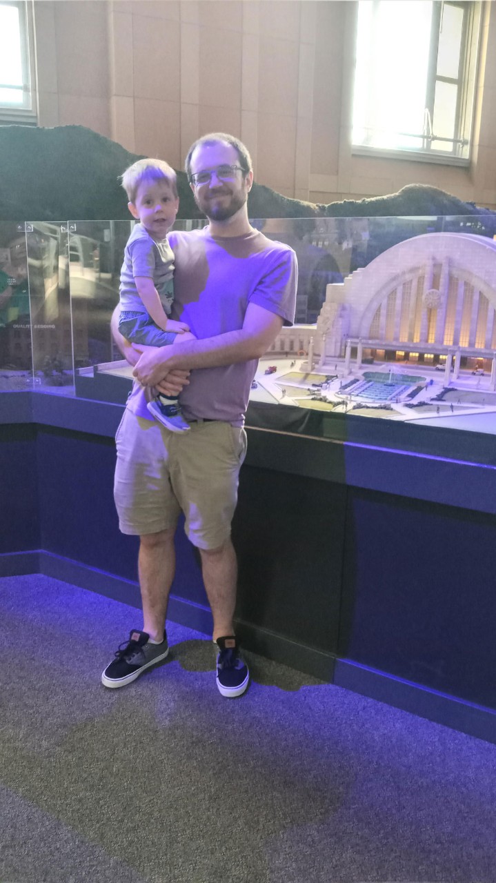 J.D. Fye with son in museum