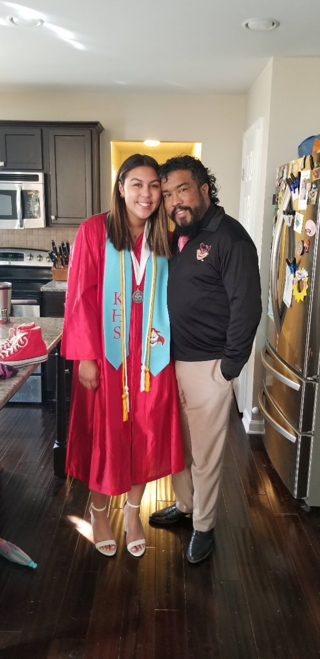Ranjiv with his daughter, Alana, before her graduation from Kings High School